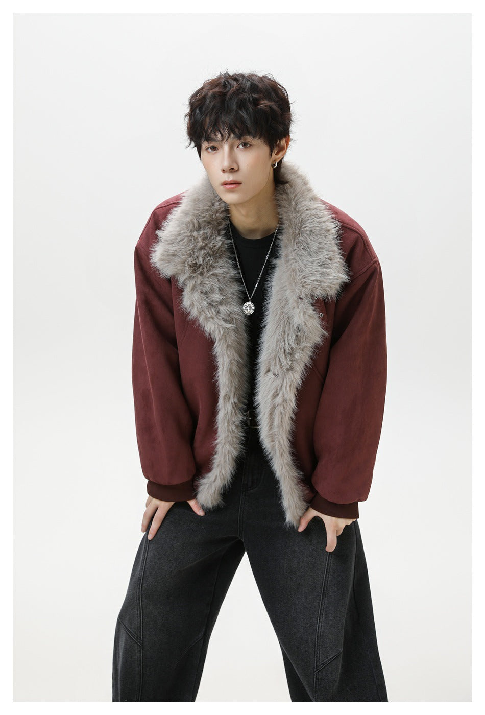 Model wearing a burgundy jacket with a large gray fur collar and open front.
