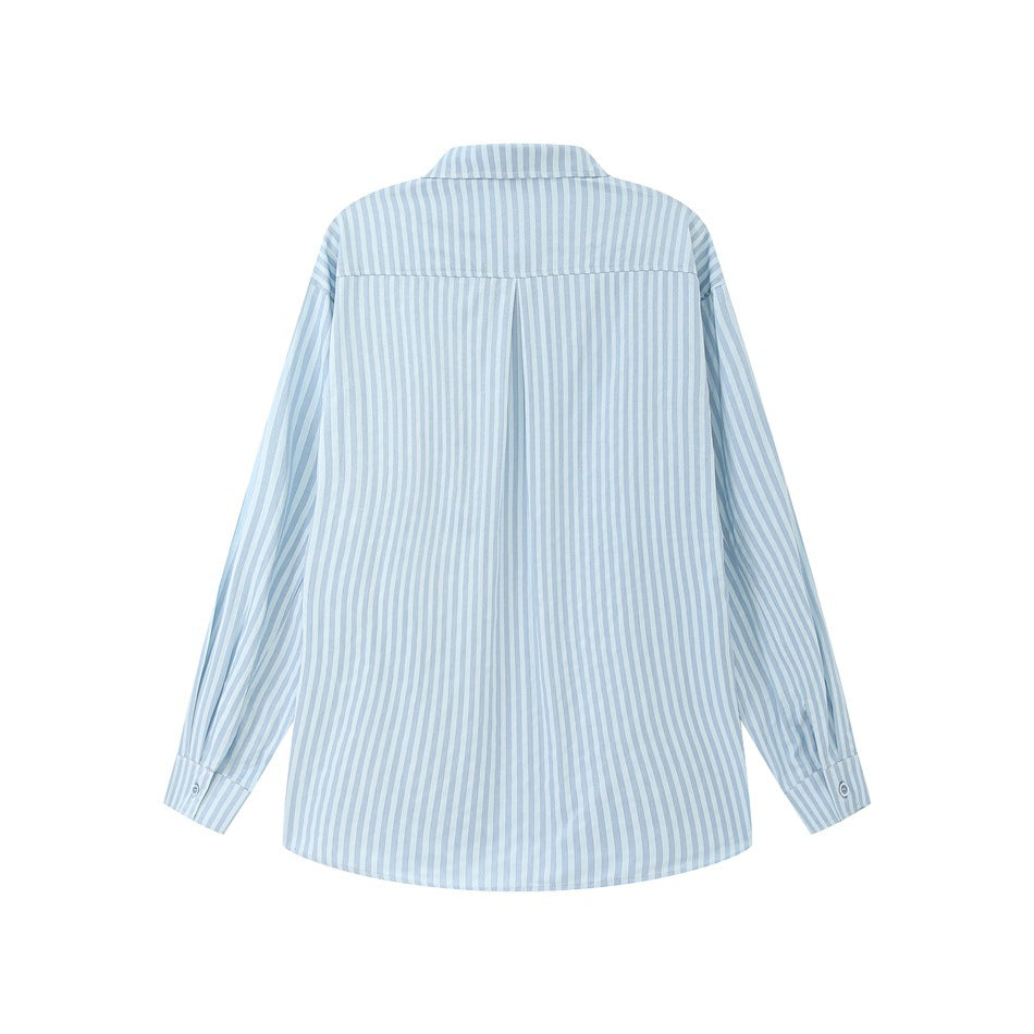 Back view of a blue-and-white vertically striped long-sleeve shirt with a center pleat and button cuffs.
