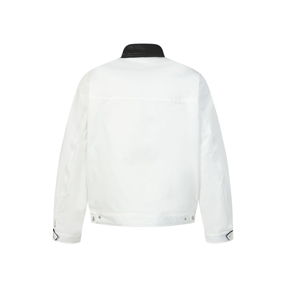 Back view of a white jacket with a black collar, long sleeves, and snap-adjustable cuffs and hem.