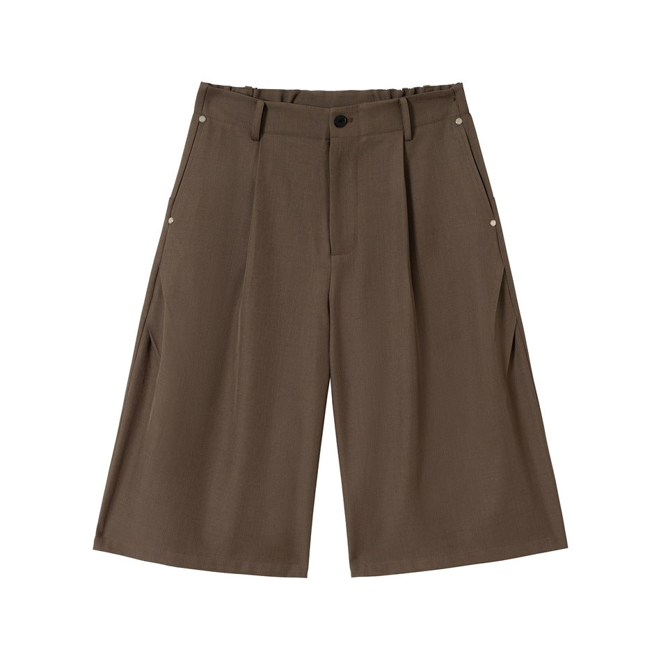Coffee brown knee-length wide-leg pleated shorts, front view flat lay