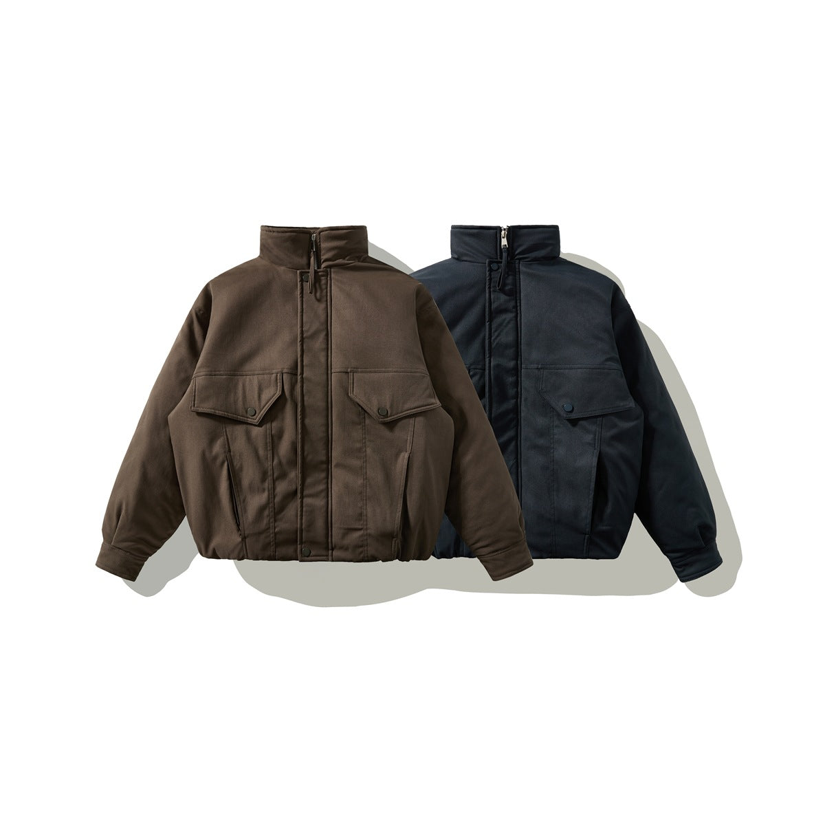 Two front views of a stand-collar jacket with snap-flap pockets, in brown and dark navy.