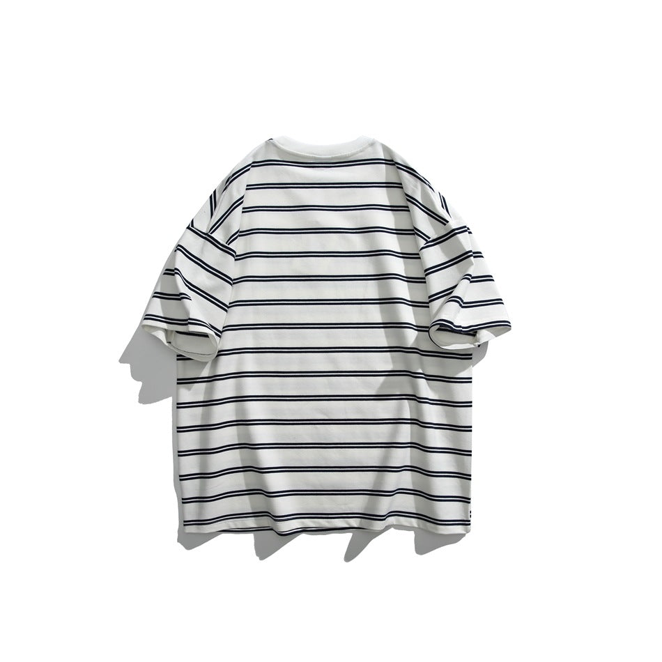 Back view of an oversized white T-shirt with thin, evenly spaced navy horizontal stripes.