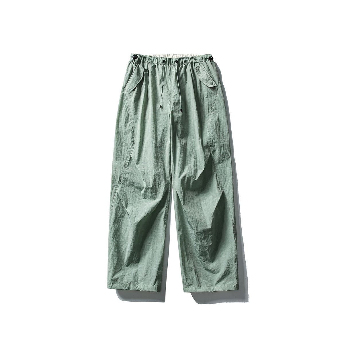 Light aqua green wide-leg pants with drawstring waist and flap pockets, flat lay front view