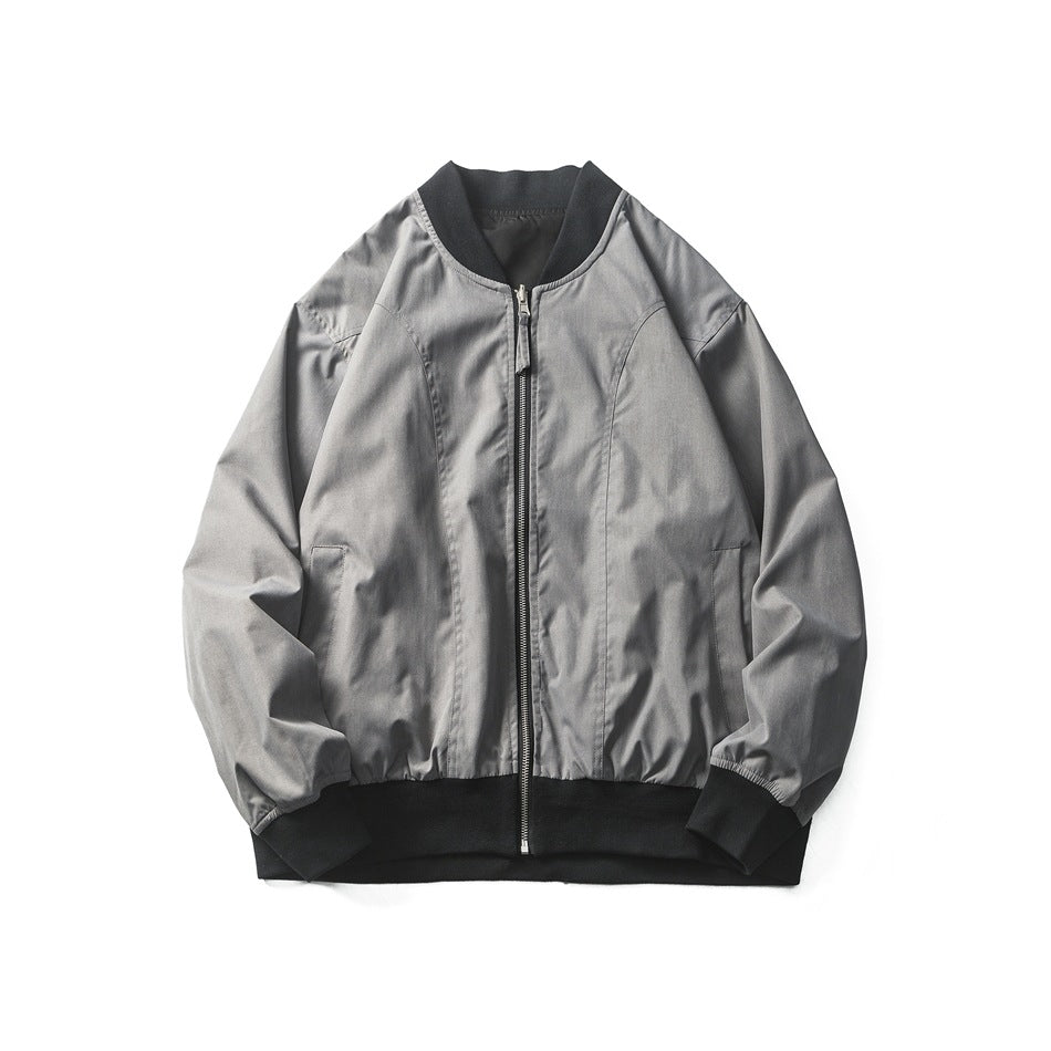 Front view of a gray bomber jacket with a center zipper, black ribbed collar, cuffs, and hem.
