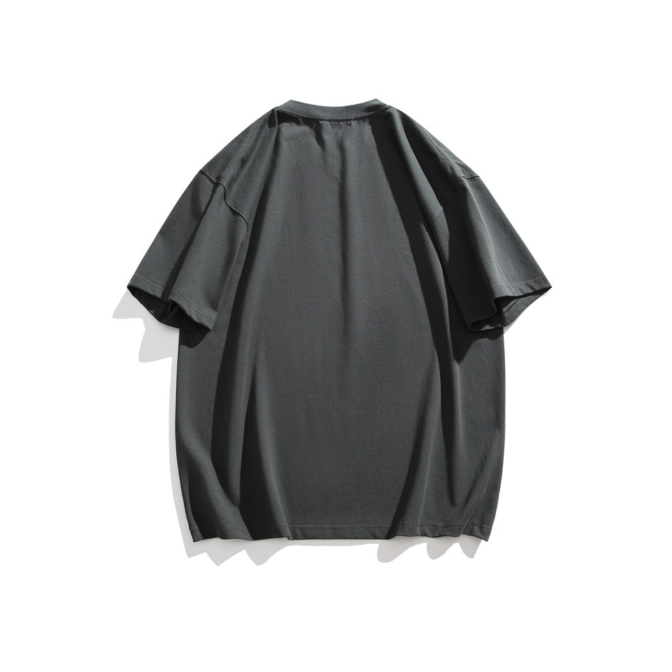 Back view of a plain charcoal gray oversized T-shirt with short sleeves, displayed flat on a white background.