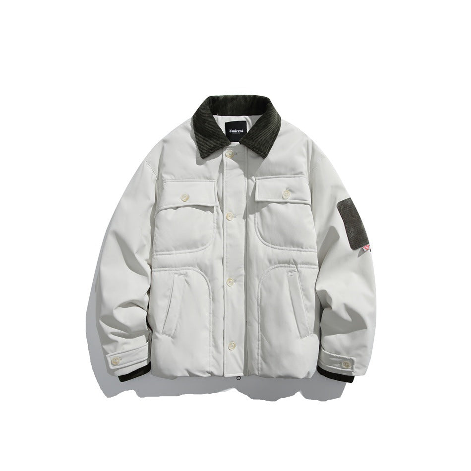 Front view of an off-white button-front jacket with a dark corduroy collar, multiple pockets, and a dark sleeve patch.