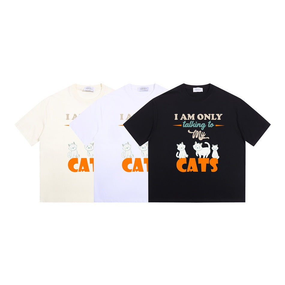 Ivory, white, and black crew-neck T-shirts with matching cat graphics and English lettering.