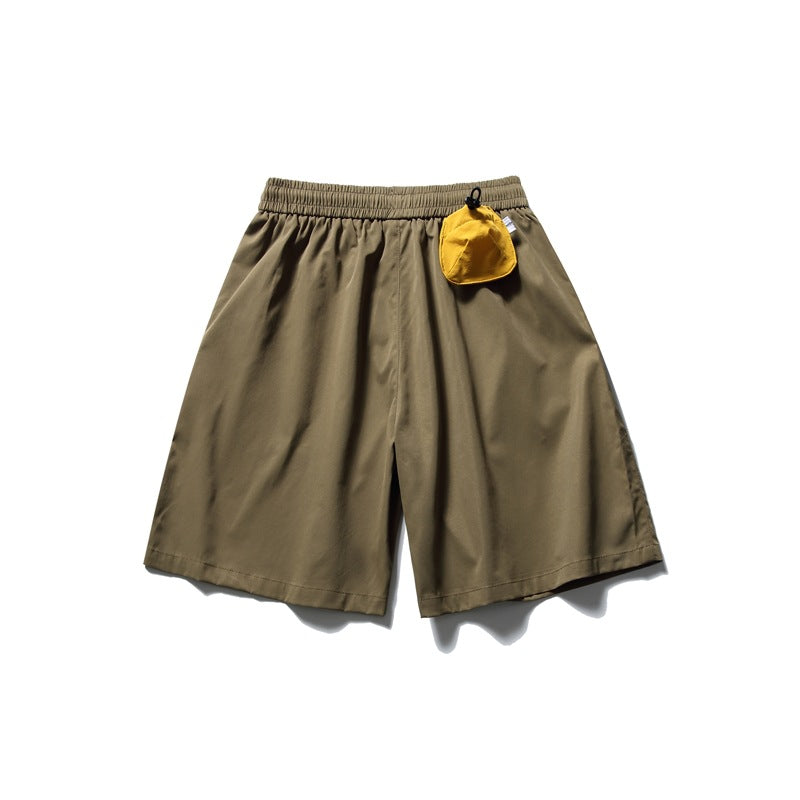 Olive shorts with an elastic waistband and a small yellow pouch attached near the waist.