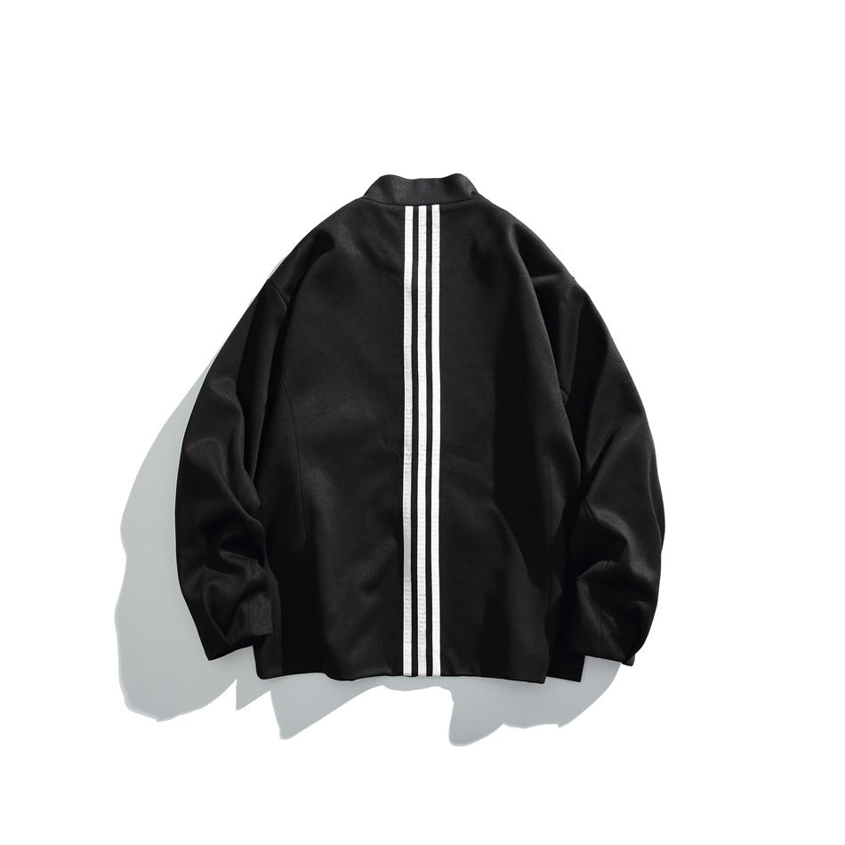 Back view of a black jacket with three narrow white vertical stripes down the center.