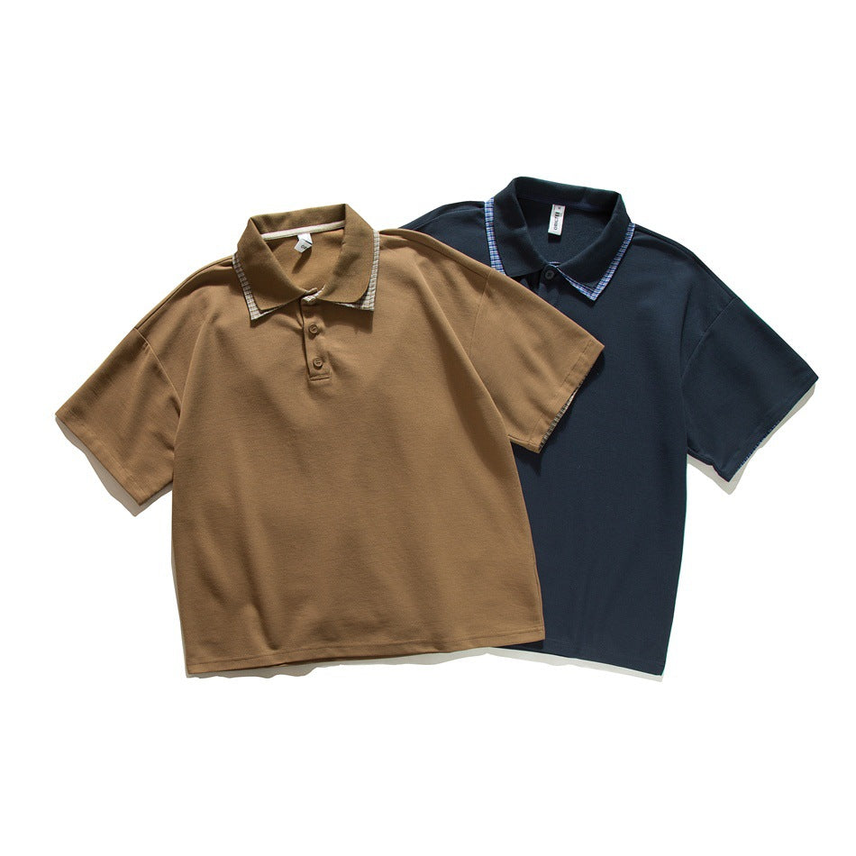 Two short-sleeve polo shirts shown from the front: tan and navy, each with plaid collar accents.