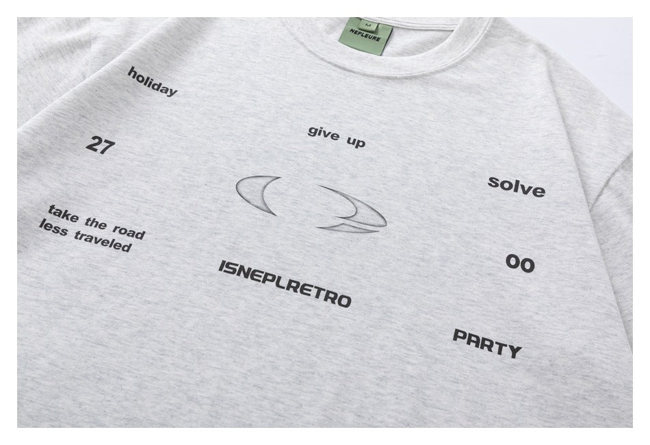 Front view of a light heather gray T-shirt with scattered black text and a central abstract graphic.