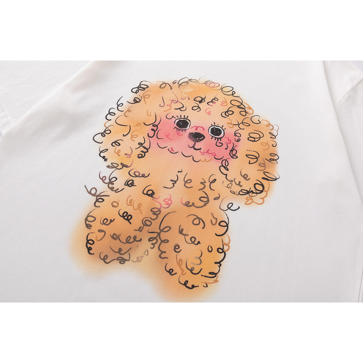 Close-up of a colorful curly-haired dog illustration printed on a white T-shirt.