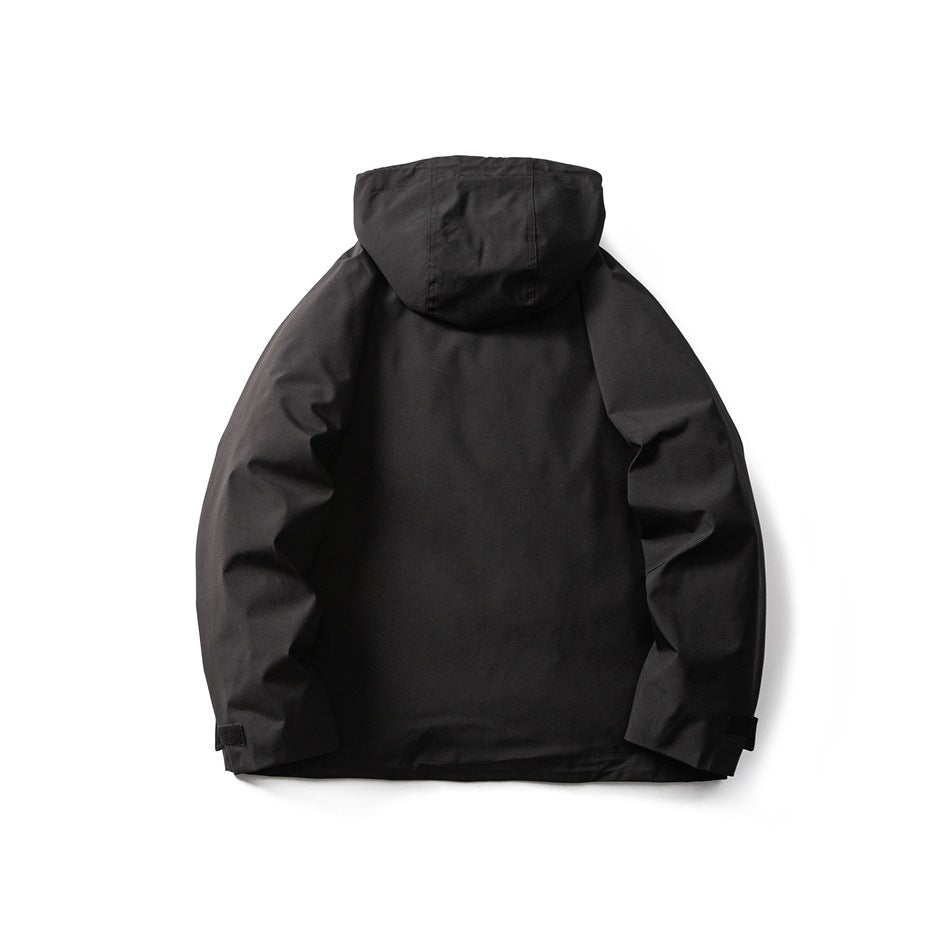 Back view of a black hooded jacket with adjustable cuffs.