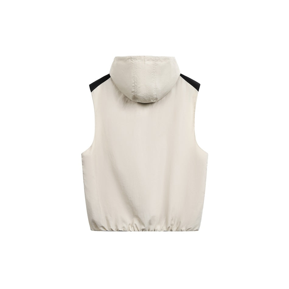 Back view of a cream sleeveless hooded vest with black shoulder accents and an elasticated hem.