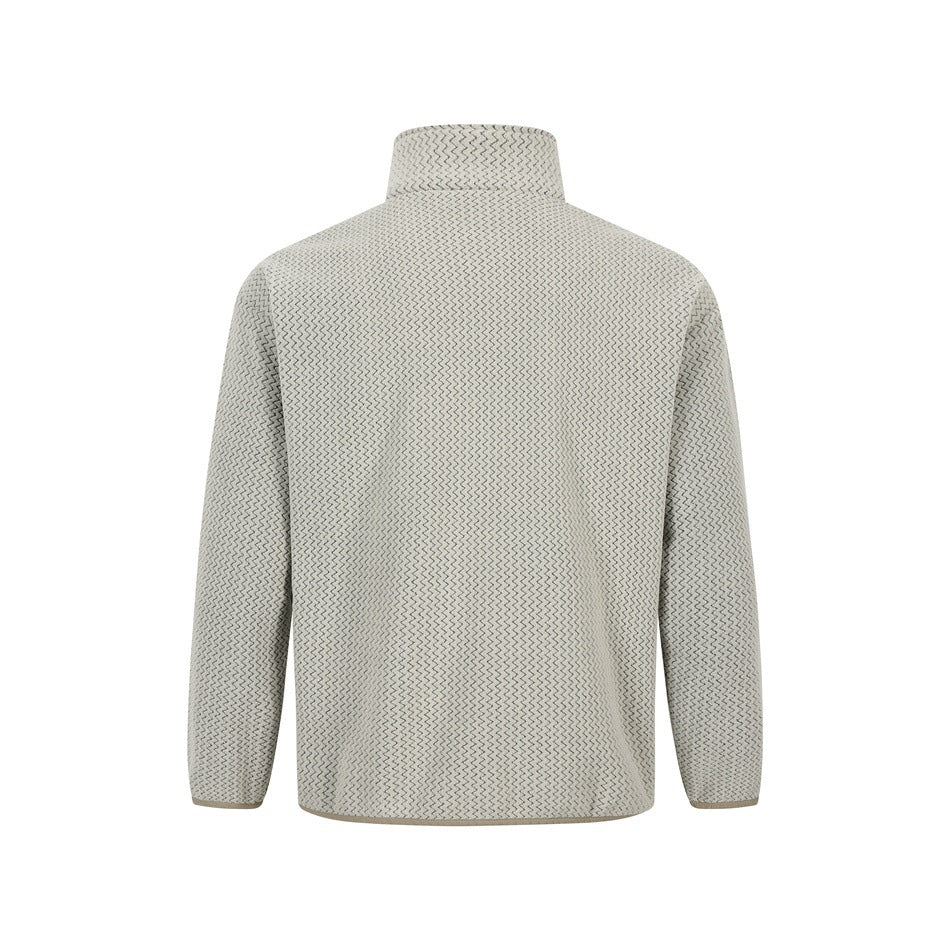 Back view of a cream pullover with a stand collar, long sleeves, and an all-over gray zigzag pattern.