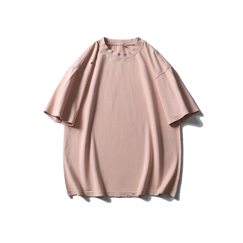 Peach pink distressed short-sleeve crew-neck T-shirt, flat front view on white background
