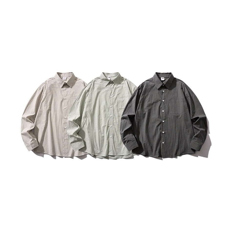 Three long-sleeve plaid button-up shirts displayed together in beige, pale green, and charcoal colorways.