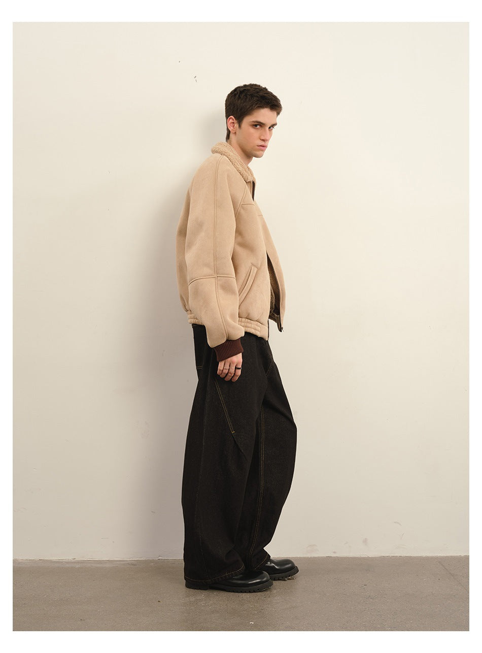 Side view of a model wearing a light beige jacket with a plush collar and dark ribbed cuffs.