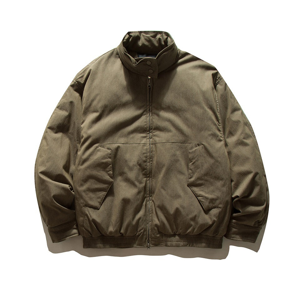 Gray-green stand-collar zip jacket with angled front flap pockets and ribbed hem, flat lay front view