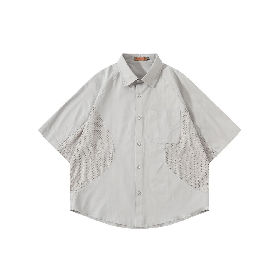 Light gray short-sleeve button-up shirt with chest pocket and perforated mesh side panels, flat front view