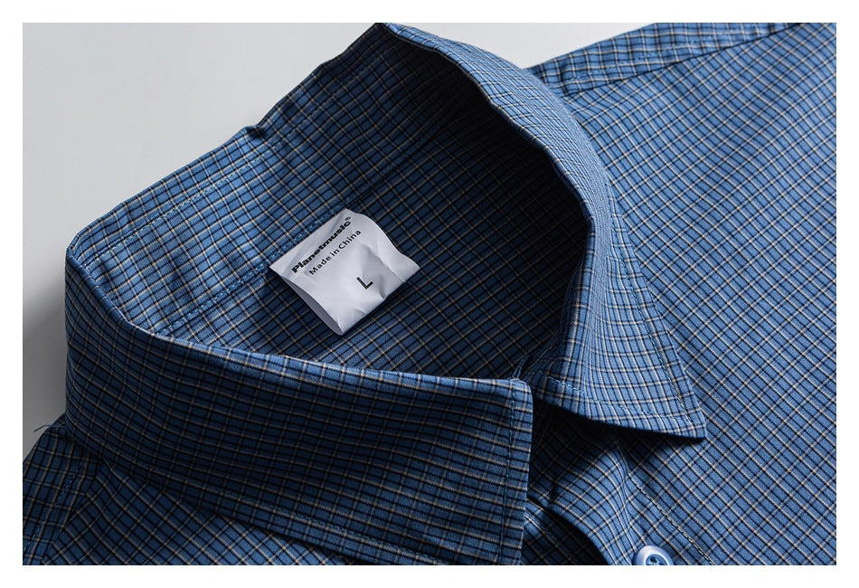 Close-up of a blue checked shirt collar and inner neck label marked size L.