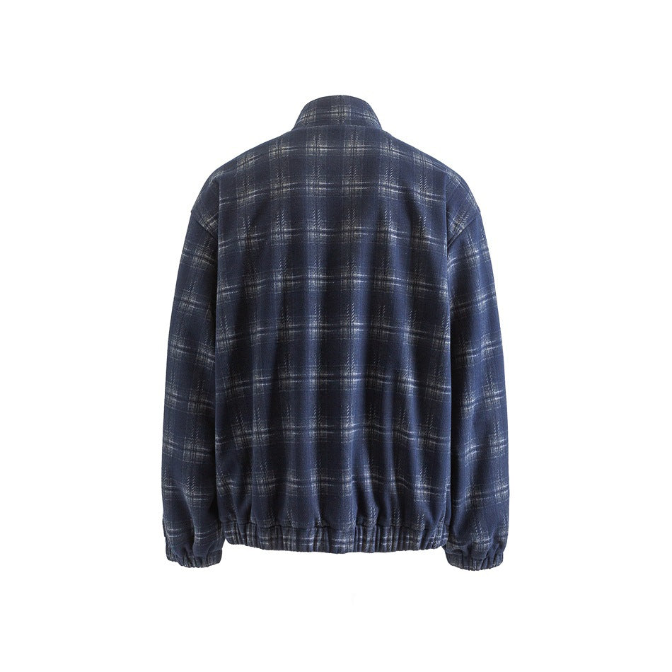 Back view of a dark navy jacket with a gray plaid pattern, stand collar, and gathered cuffs and hem.