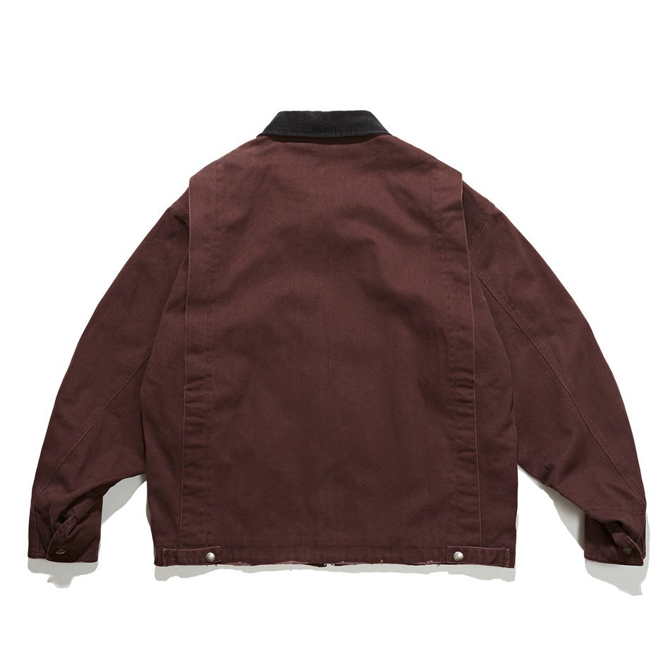 Back view of a burgundy jacket with a black collar, panel seams, cuff tabs, and snap-adjustable hem tabs.
