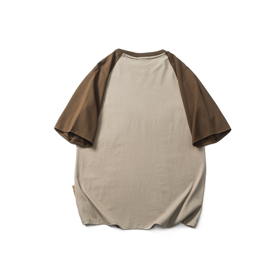 Back view of a taupe raglan T-shirt with dark brown sleeves, laid flat against a white background.