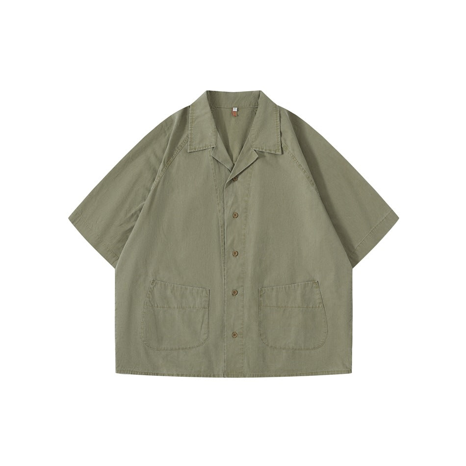 Olive green short-sleeve button-front shirt with notched collar and two patch pockets, flat lay front view