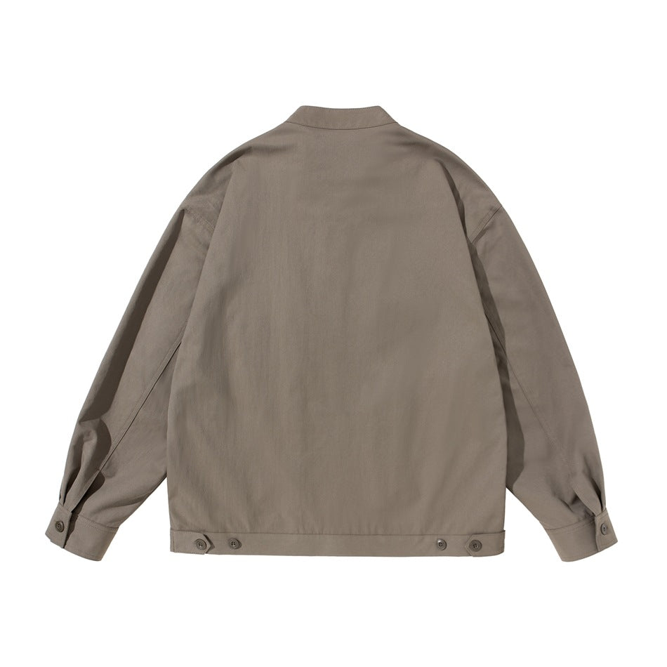 Back view of a taupe jacket with long sleeves, buttoned cuffs, and adjustable hem tabs.