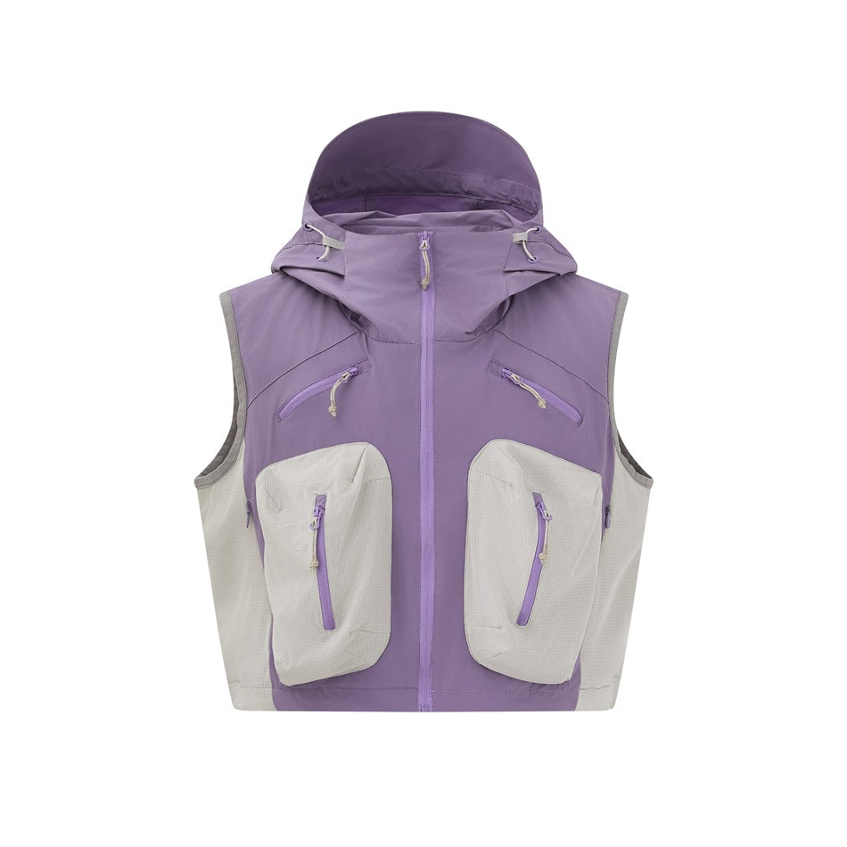 Purple hooded utility vest with light gray side panels and two large zippered front pockets on a white background