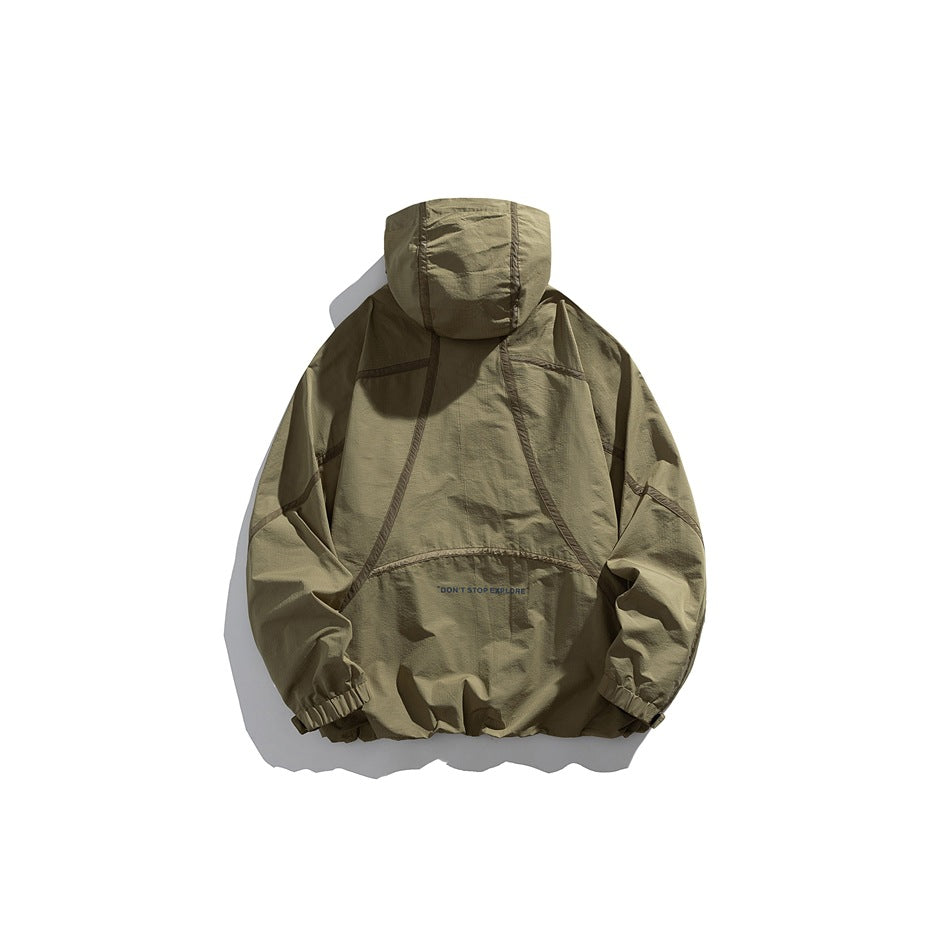 Olive hooded pullover jacket shown from the back, with dark seam detailing and elastic cuffs.