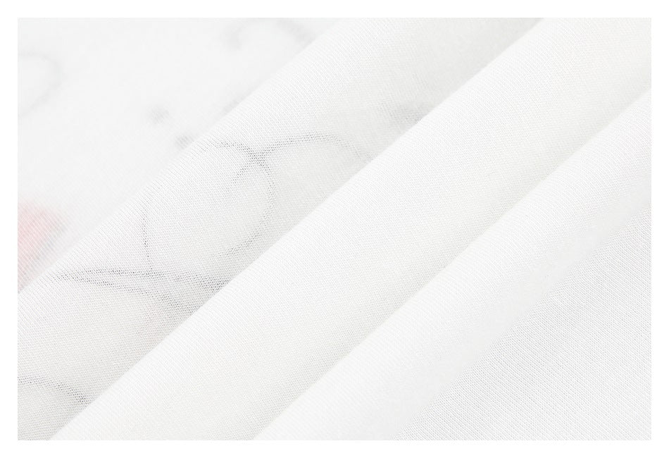 Close-up of layered white fabric showing its fine texture and slight transparency.