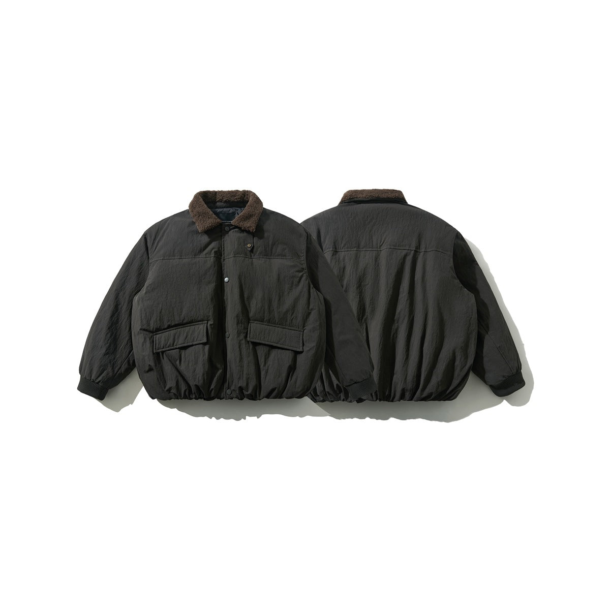 Dark jacket shown from the front and back, with a brown textured collar, flap pockets, and ribbed cuffs.