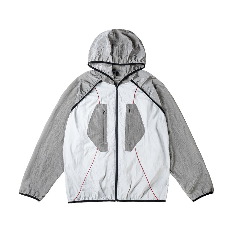 Gray and white zip-up hooded jacket with raglan sleeves, angular zip chest pockets and red piping, flat lay front view