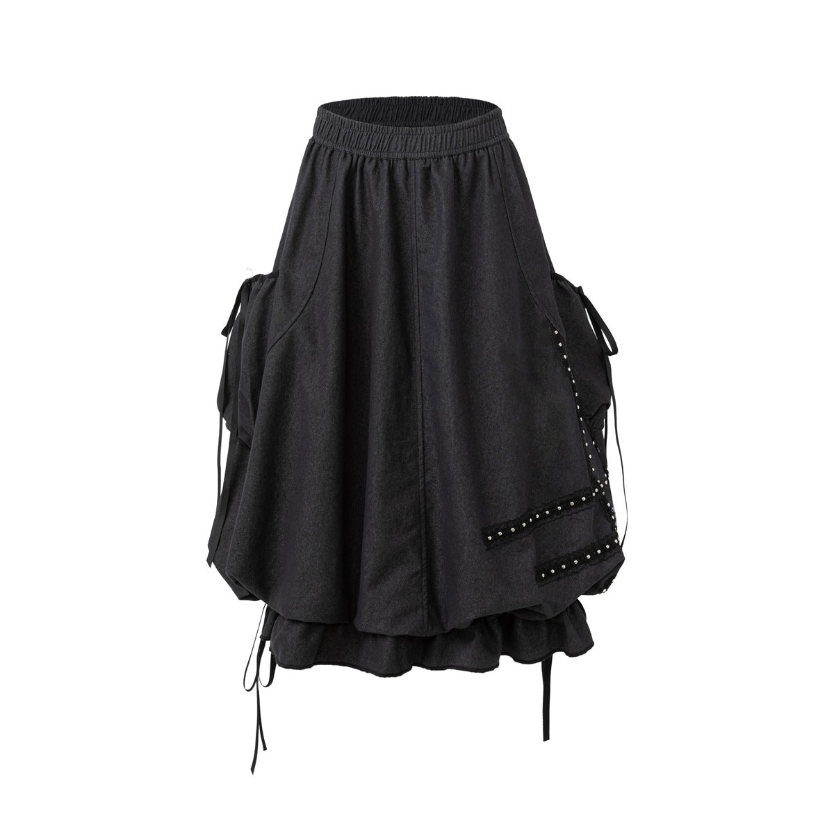 Front view of a charcoal-black gathered skirt with side ties, studded panel accents, and a ruffled hem.