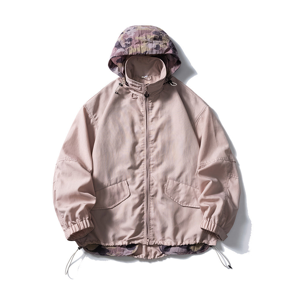 Dusty pink hooded zip jacket with camouflage hood lining, flap pockets and drawcord hem, flat lay