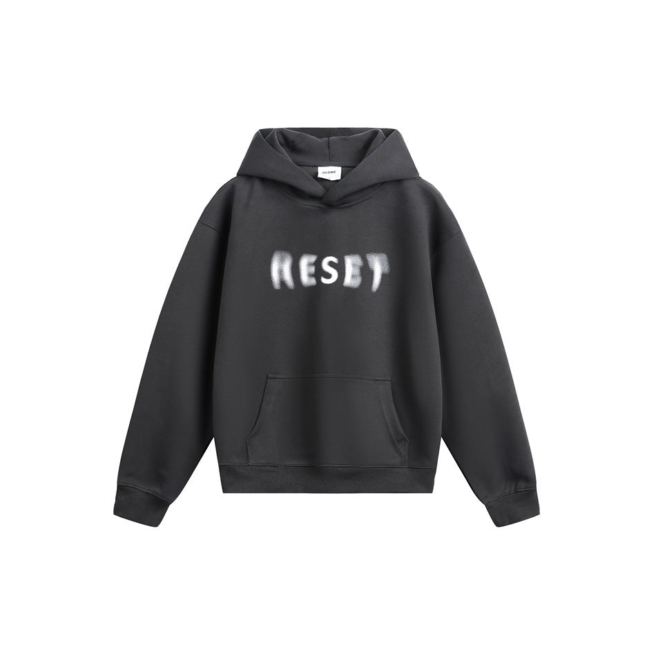 Dark gray pullover hoodie flat lay with blurred white RESET chest print and front kangaroo pocket