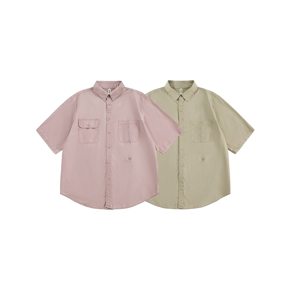 Two short-sleeve button-up shirts displayed side by side in dusty pink and khaki.