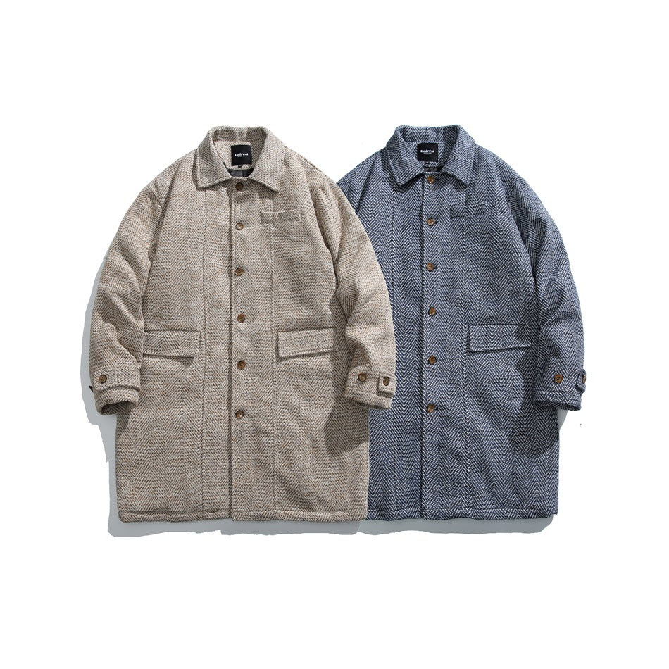 Two button-front patterned coats displayed side by side in beige and dark blue, with collars and front pockets.