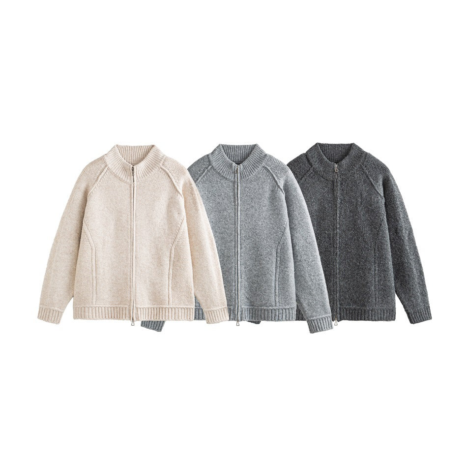 Three zip-front knit jackets shown together in cream, light gray, and dark charcoal.