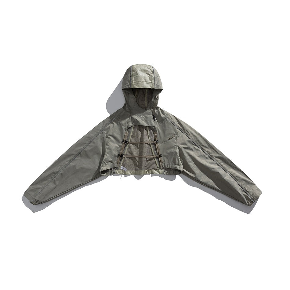 Front view of a gray-green hooded jacket laid flat with sleeves spread and adjustable straps across the chest.
