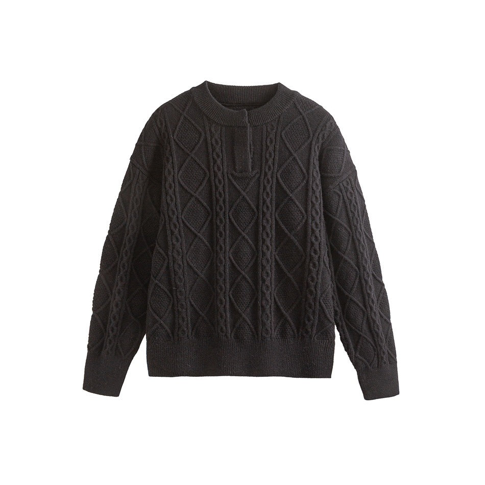 Black cable-knit pullover sweater with diamond pattern, ribbed crew neck and short placket, flat lay front view