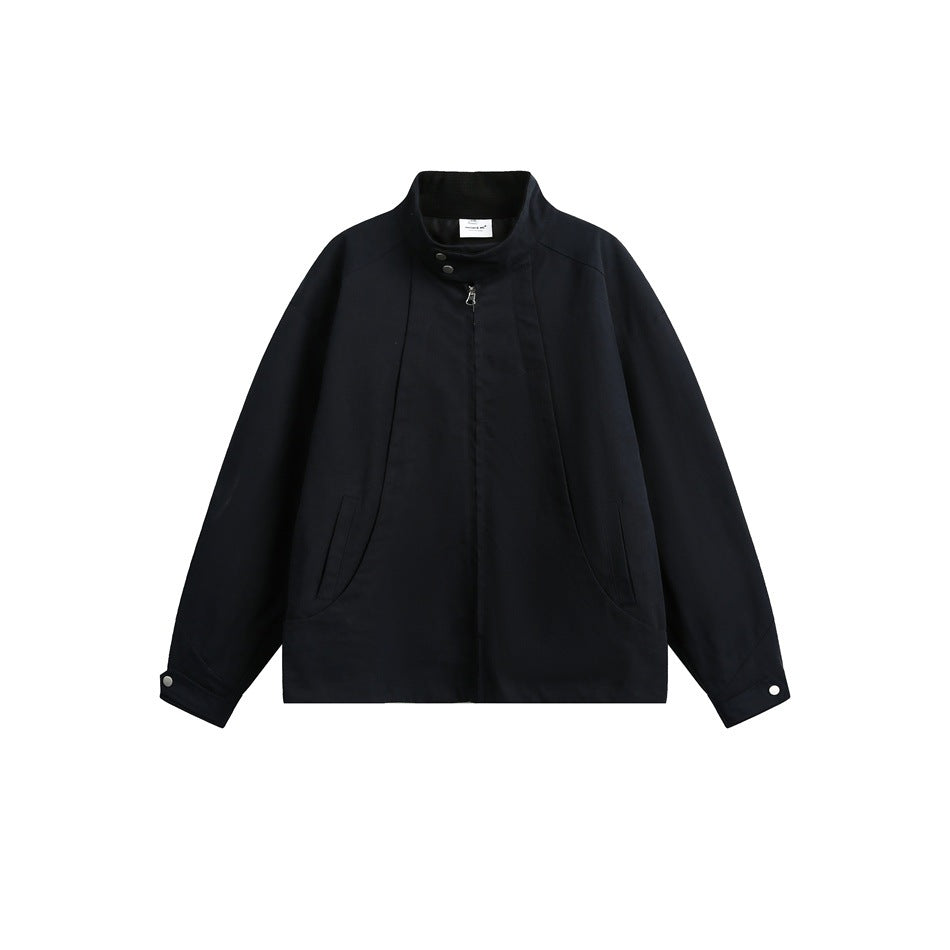 Dark navy stand-collar zip jacket flat lay, front view with curved seams, slanted pockets and snap cuffs