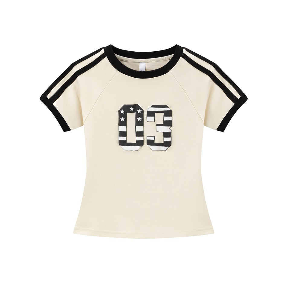 Apricot short-sleeve tee with black ringer trim, shoulder stripes and a striped star-print 03 graphic on the chest