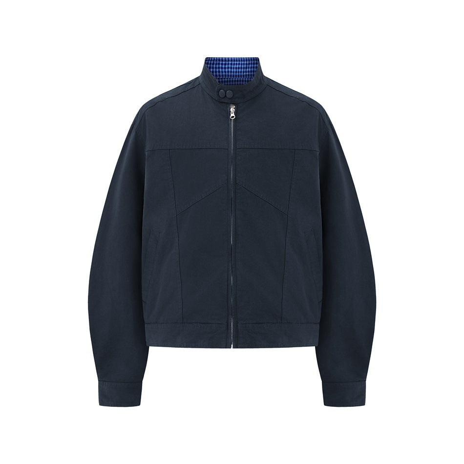 Navy stand-collar zip jacket with paneled front, snap collar tab and blue checked collar interior, flat front view