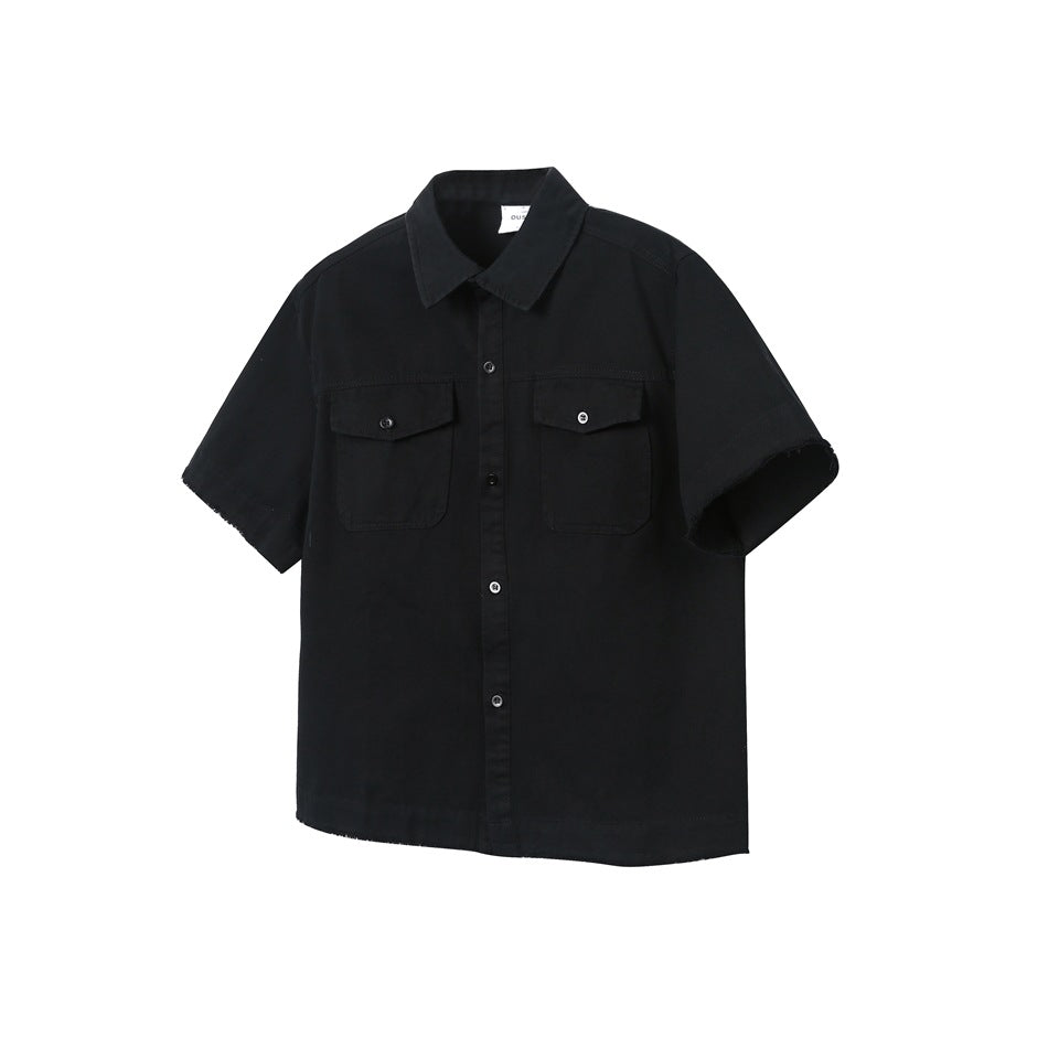 Black short-sleeve work shirt with two flap chest pockets, button front and frayed sleeve edges, flat view