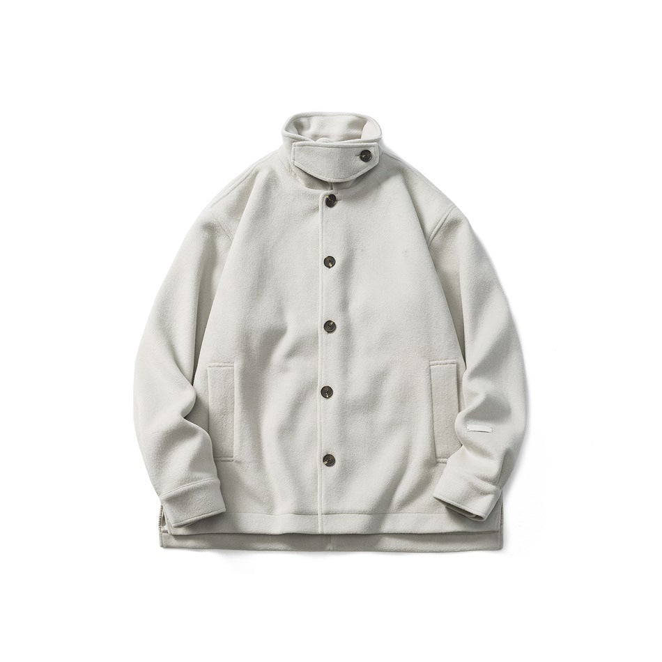 Beige-gray stand-collar button-front jacket with side pockets and button cuffs, flat lay front view