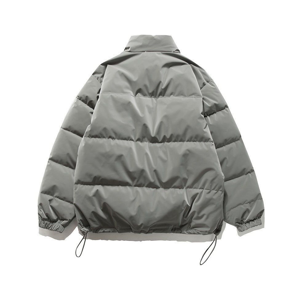 Back view of a gray puffer jacket with horizontal quilting, elastic cuffs and adjustable hem cords.