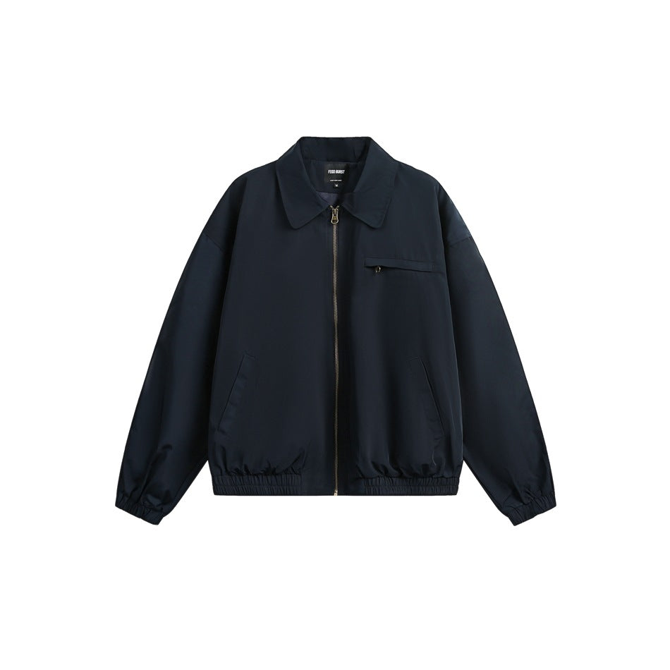 Navy blue collared zip-up jacket flat lay with chest zip pocket, side pockets and elastic cuffs and hem